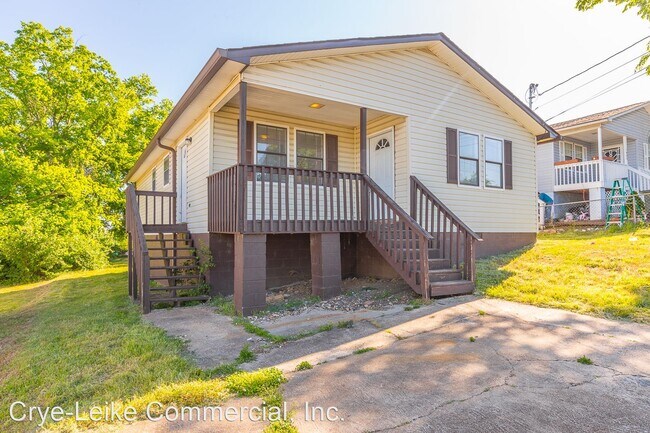 Building Photo - 4 br, 1.5 bath House - 1403 East 5th St.