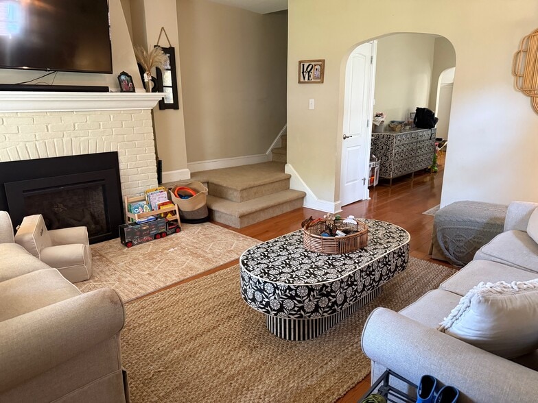 fireside space with second floor stair access - 130 Simpson Rd