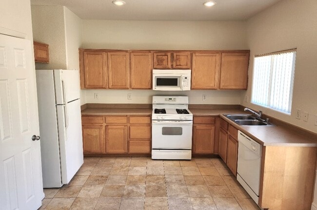 Building Photo - 10544 Blanca Peak Ave