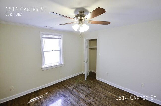 Building Photo - Updated spacious 5-bed with a fenced-in yard!