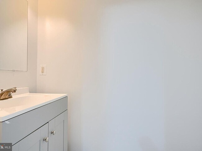 Building Photo - Updated End-of-Group Townhome with Finished Lower Level, Fenced Yard & Community Pool