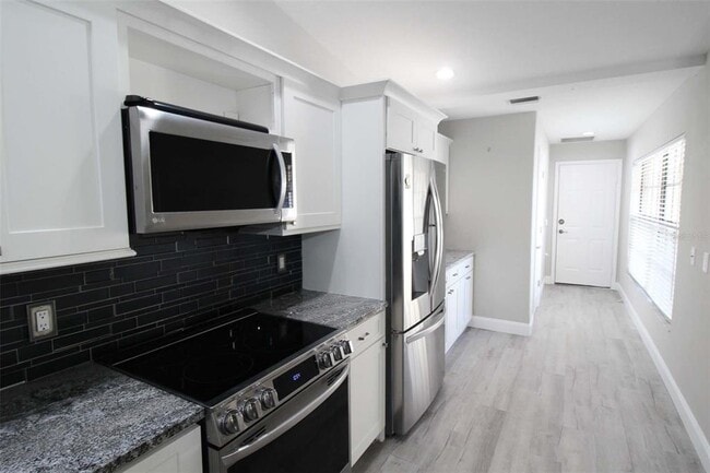 Building Photo - 6019 Courtside Dr
