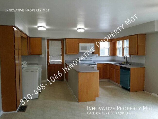 Building Photo - Spacious 4 bedroom , 1 1/2 bath home in Ga...