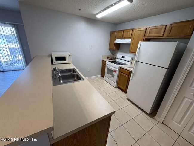Building Photo - 6070 Maggies Cir
