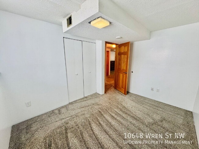 Building Photo - 10648 Wren St NW