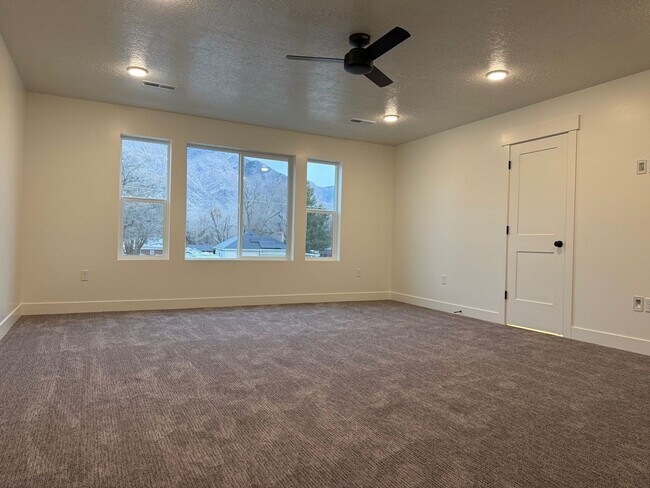 Building Photo - Half off first months rent - Beautiful townhome with 2 car garage, Central Air and Master Suite