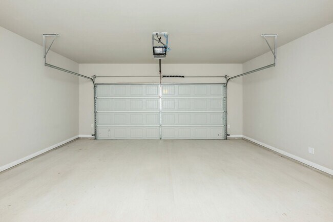 Building Photo - Live, love, and grow in this charming townhome!