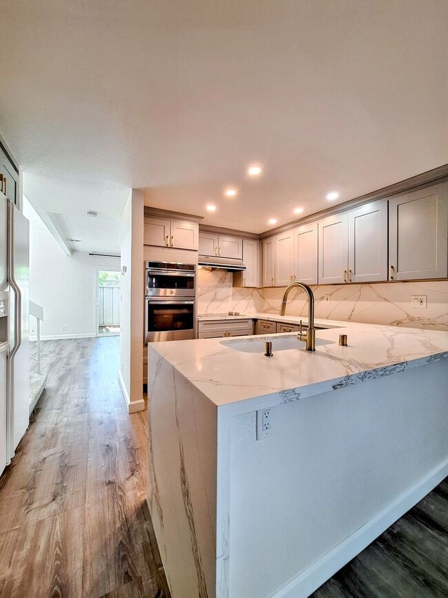 Building Photo - Spacious Two-Story 3bd Townhouse With Private Patios, Balcony, & Garage