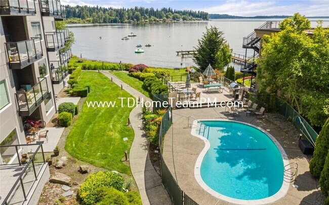 Building Photo - "Charming 1-Bed Waterfront Retreat with Scenic Lake Views & Pool in Kirkland!"