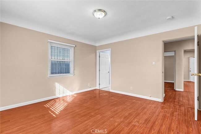 Building Photo - 9807 S Denker Ave