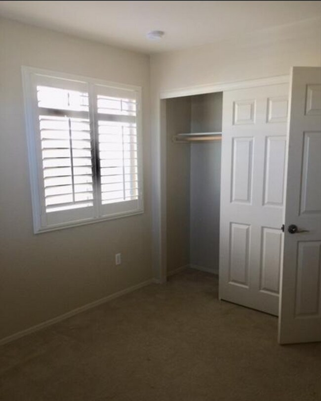 Building Photo - Adorable 2 story patio style with three spacious bedrooms and two full baths upstairs
