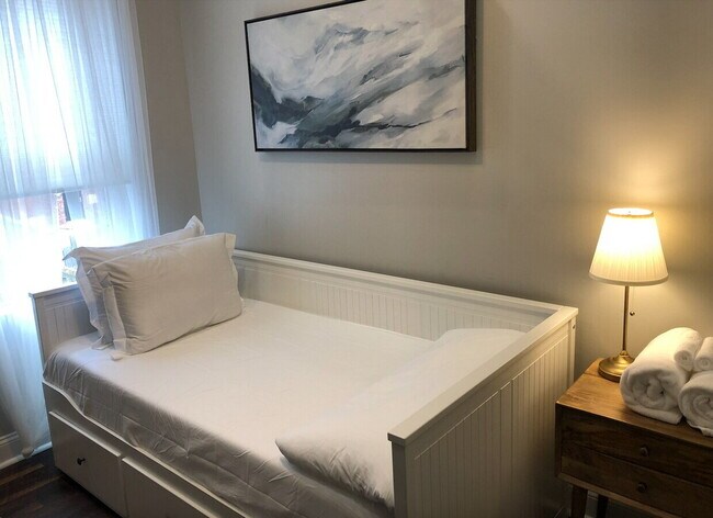Building Photo - Chic Urban Living: Furnished 2-Bed Townhouse with Finished Basement in Pittsburgh's Strip District!