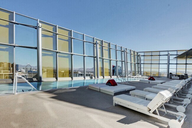 Building Photo - Stunning Strip Views from this Fully Furnished Studio Residence.