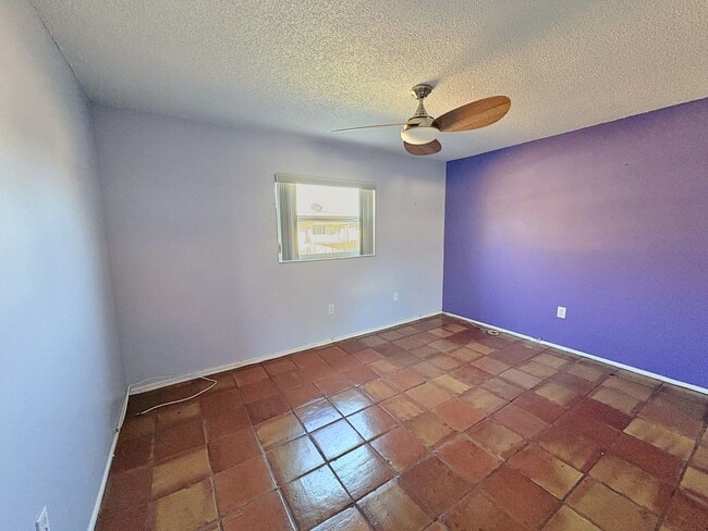 Building Photo - 3 Bed 2 Bath Home with Large Fenced Backyard & Screened Lanai — Available Now