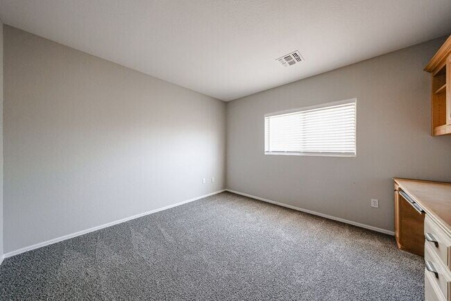 Building Photo - Introducing a stunning 4-bedroom, 2.5-bath...
