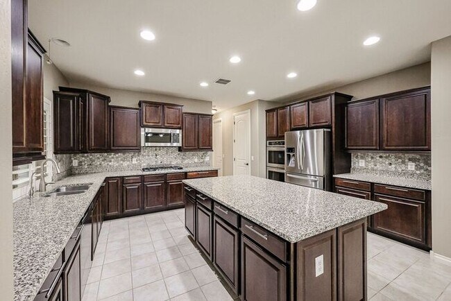 Building Photo - COMING SOON! Great Location!Stunning 6-bedroom Plus 7, 4.5-bathroom home located in Chandler