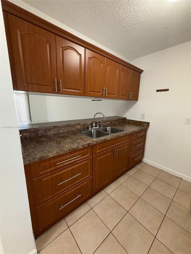Building Photo - 8560 N Sherman Cir