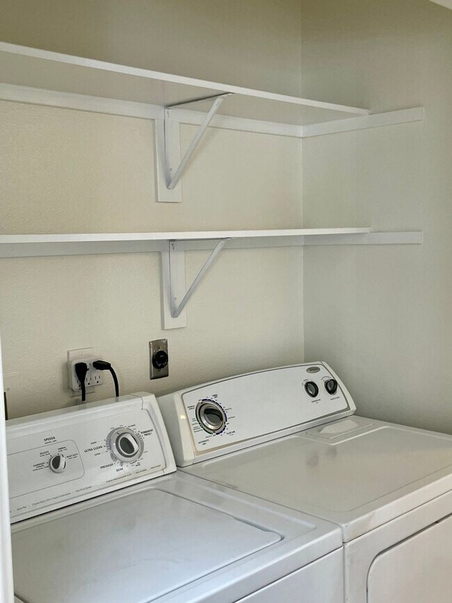 Building Photo - Welcome to Coastal Living at Its Finest!
