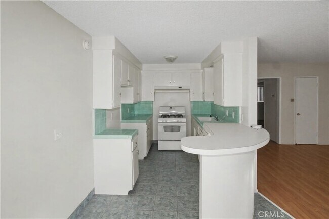 Building Photo - 13609 Van Ness Ave