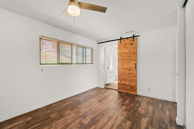 Building Photo - ***MOVE IN SPECIAL*** Modern 3BR Townhome | Garage + Driveway Parking | Yard | Pool | Pet Friendl...