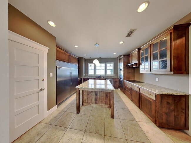 Building Photo - Hospital District Gem: Spacious 2-Story on Corner Lot with Game Room & Outdoor Retreat