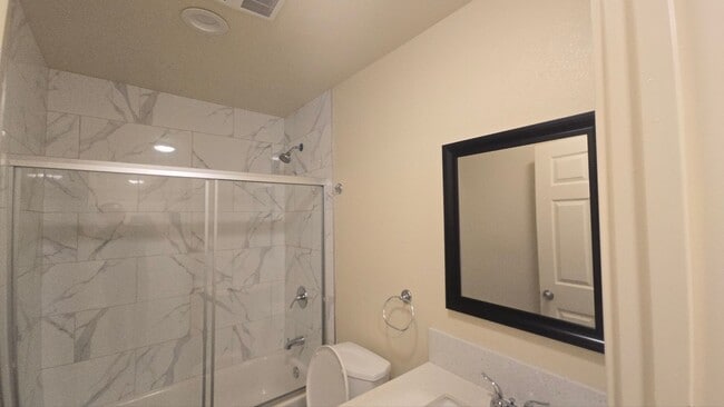 Building Photo - All Bed& Bath at 1st ,2 car Assigned Parking Space at back with access alley,tile &laminate floor...