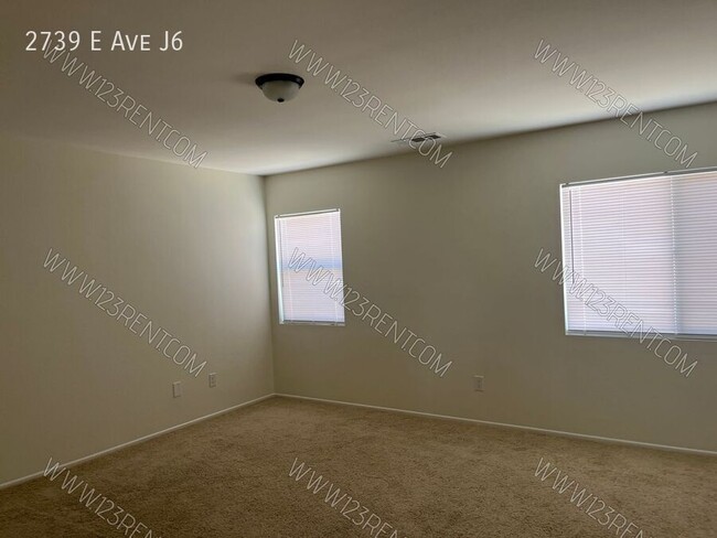 Building Photo - 2739 E Ave J6