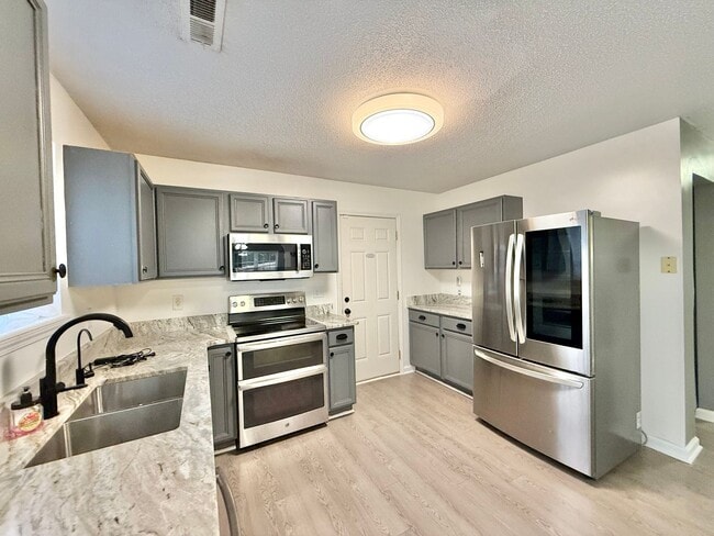 Building Photo - Newly Remodeled 4BD, 2.5BA Raleigh Home wi...