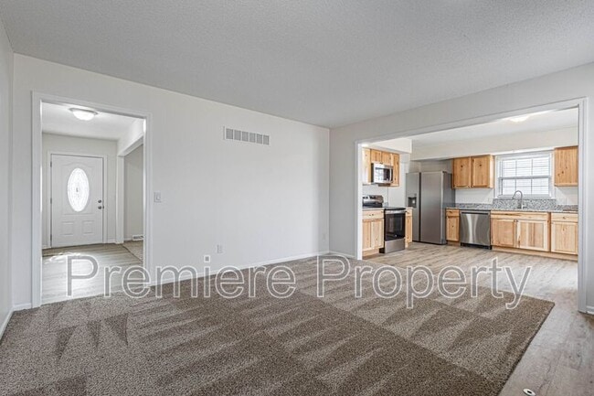 Building Photo - 5708 NW Raintree Ct