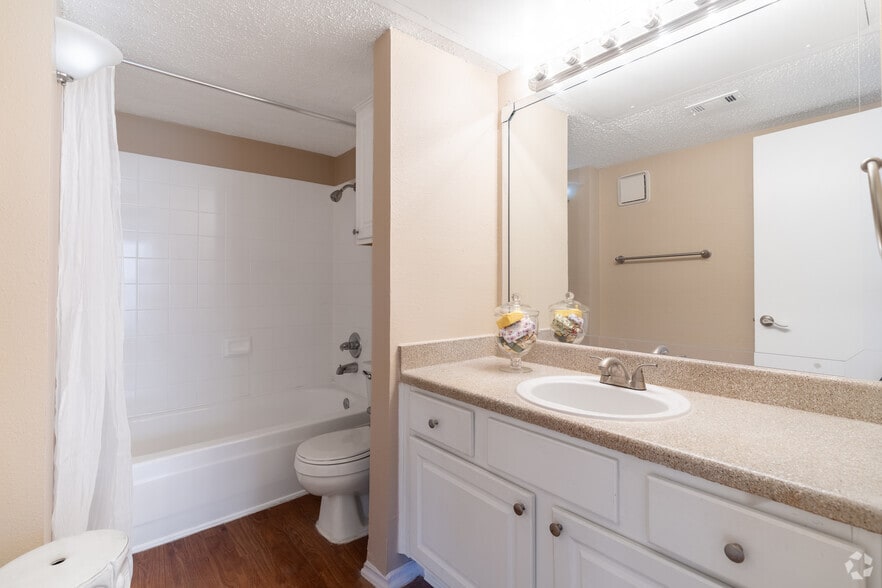 1BR, 1BA – 742SF Bathroom – Bathroom with vanity and bright lighting near Arlington TX - Three60 North Apartments