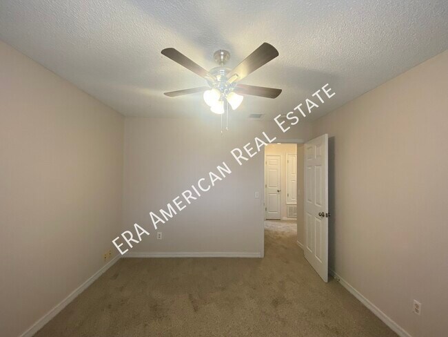 Building Photo - 7418 Woodmont Rd