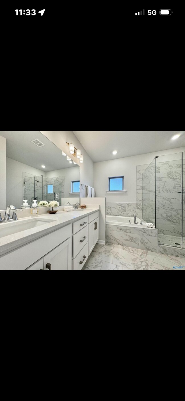 Building Photo - "NEWLY BUILT- Spacious 4-Bedroom Haven with Granite Elegance and Cozy Fireplace in Harvest"