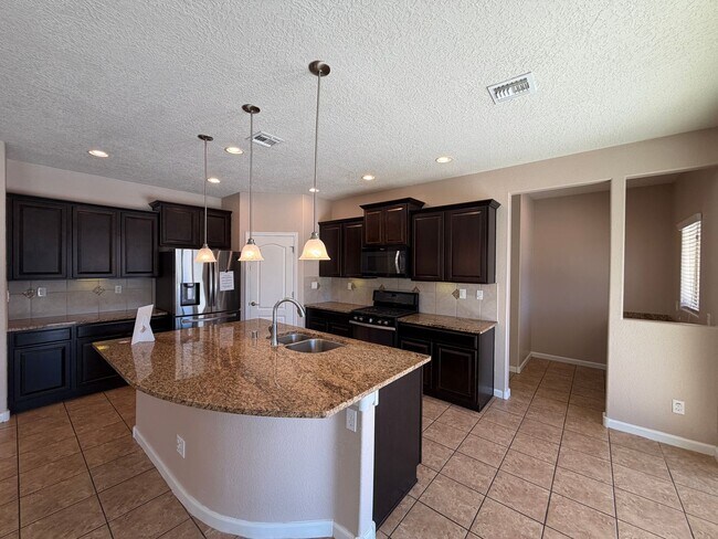 Building Photo - 4 Bedroom + Office Home Available Near Loma Colorado Blvd NE & Broadmoor Blvd NE in Rio Rancho!