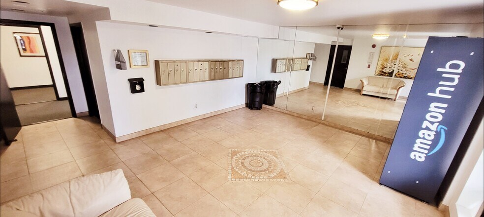 Front lobby with Amazon Locker and Amazon Business Key to keep packages safe. - 14126 Tiara St