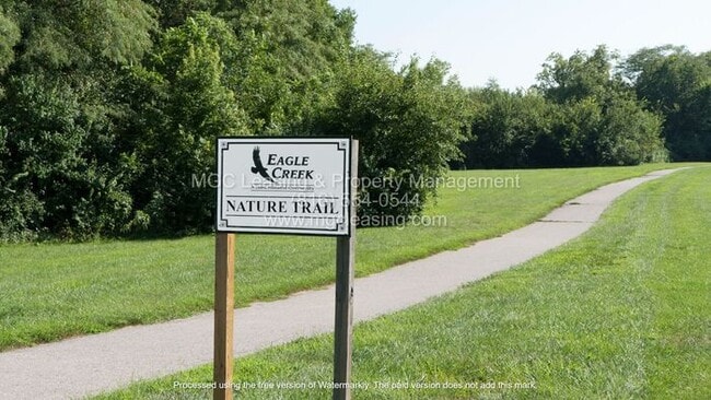 Building Photo - Eagle Creek Townhome with primary bedroom and bath on 1st level! June Specials Available
