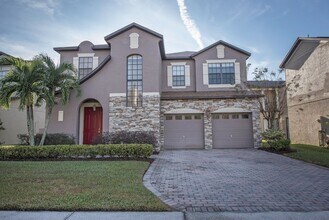 Building Photo - Large, Executive style 3/2.5 Lakefront/POOL Home in East Park of Lake Nona
