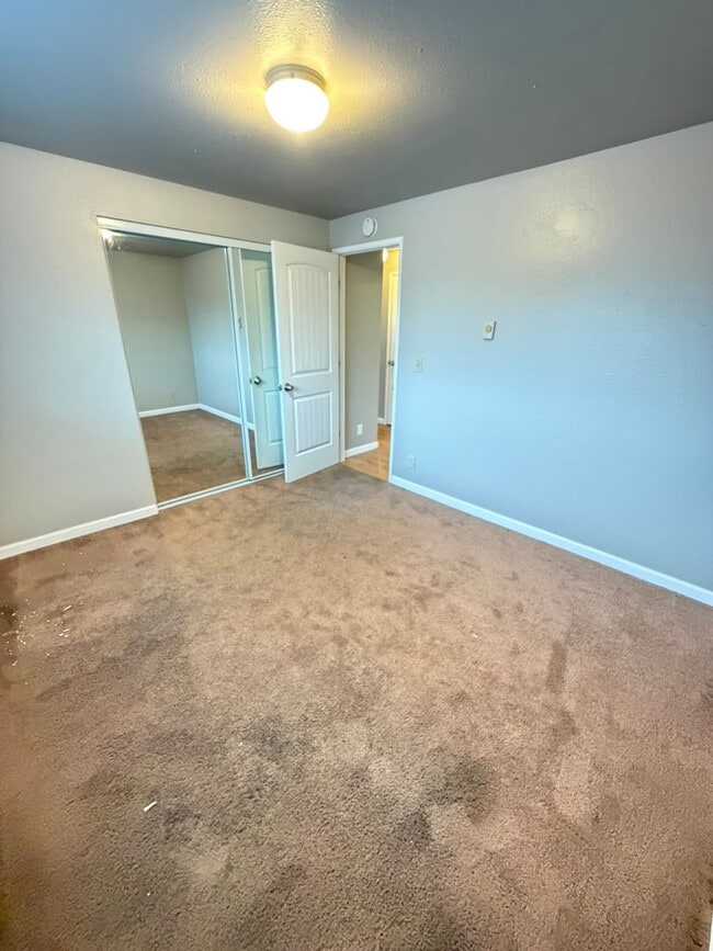 Building Photo - Update Two Bedroom on the First Floor with Covered back patio!