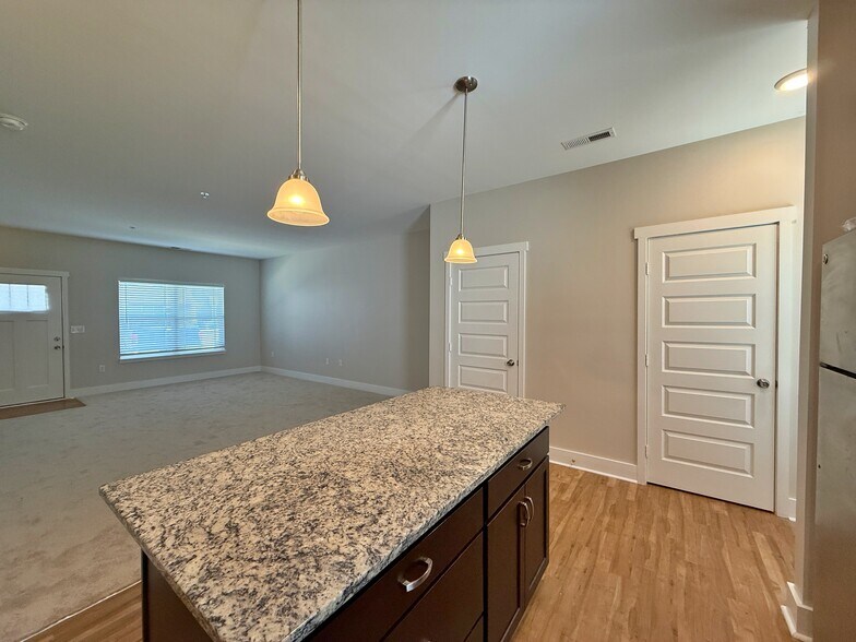 The center island is perfect for entertaining. - 3010 Bellflower Cir