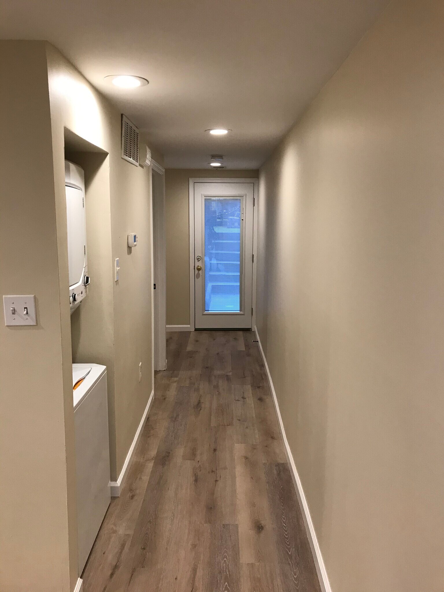 Hallway leading to bedrooms and bathroom - 1448 Newton St NW