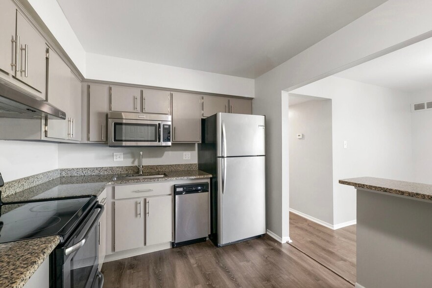 Building Photo - 8657 Kennedy Cir N