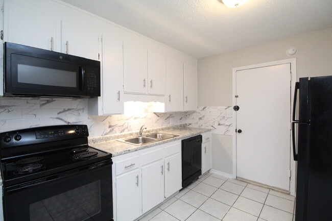 Building Photo - Updated 2BR/1BA Duplex Off 9 Mile Rd | All Tile Flooring | Pet-Friendly | Immediate Move-In