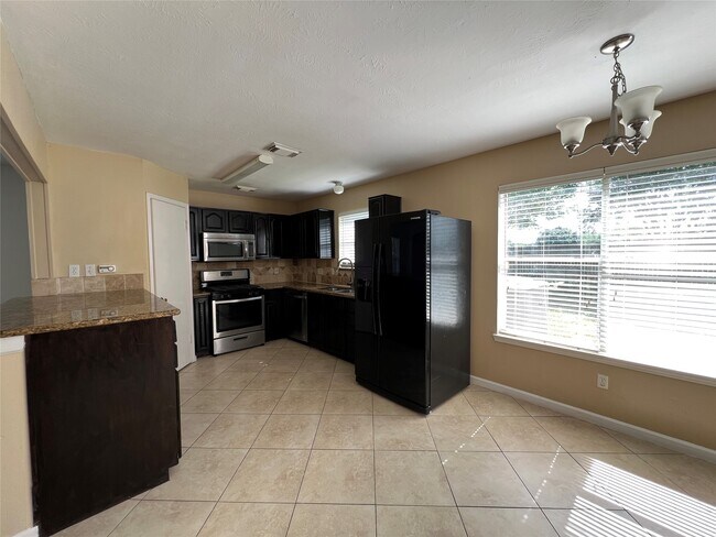 Building Photo - 8411 Tamayo Dr