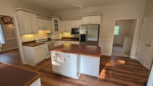 Building Photo - Stylish, Move-In-Ready Home with Designer Touches and Scenic Privacy