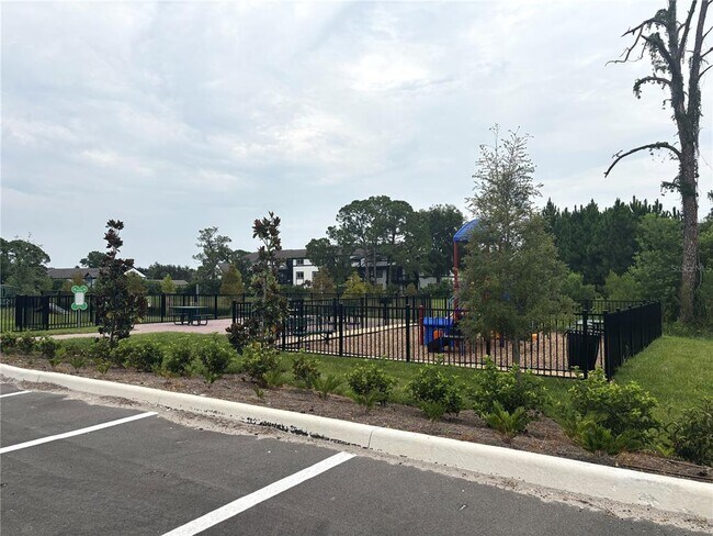 Building Photo - 5563 Millennia Park Dr