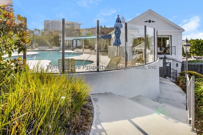 Building Photo - Updated Newport Beach Condo in Gated Versailles Community with Resort-Style Amenities