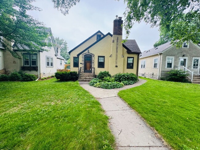 Building Photo - Charming 4-Bedroom Home with 3 Full Baths & Beautiful Hardwood Floors at 5125 Columbus Ave, Minne...