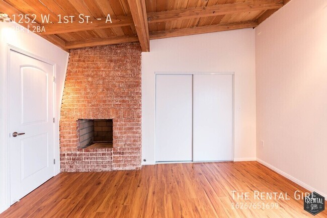 Building Photo - Spectacular 2 Bedroom W/ Exposed Beams & B...