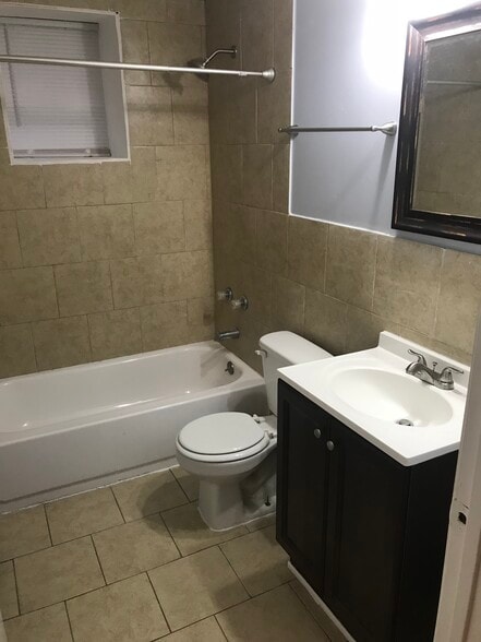 Building Photo - 6117 S Vernon Ave