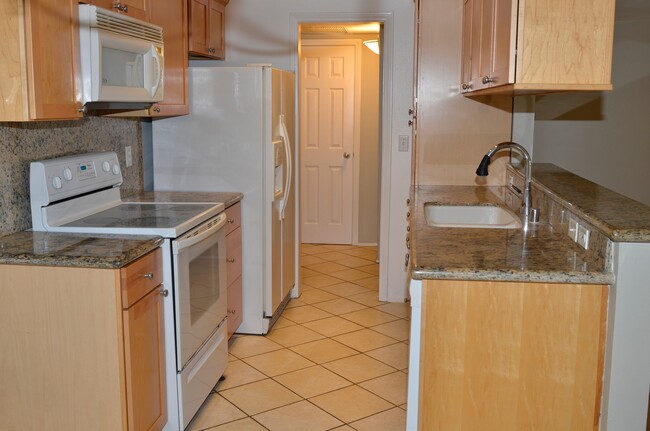 Kitchen from dining area - 521 Montana Ave