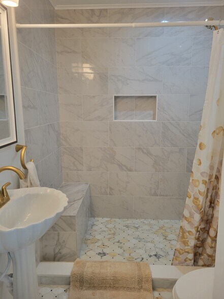 Downstairs bathroom/shower - - Newly renovated - 1220 Harmony St